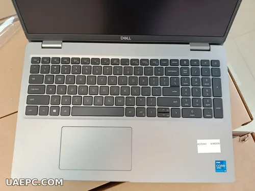 Second-hand business laptops stacked for a bulk order — B2B wholesale, Sharjah UAE