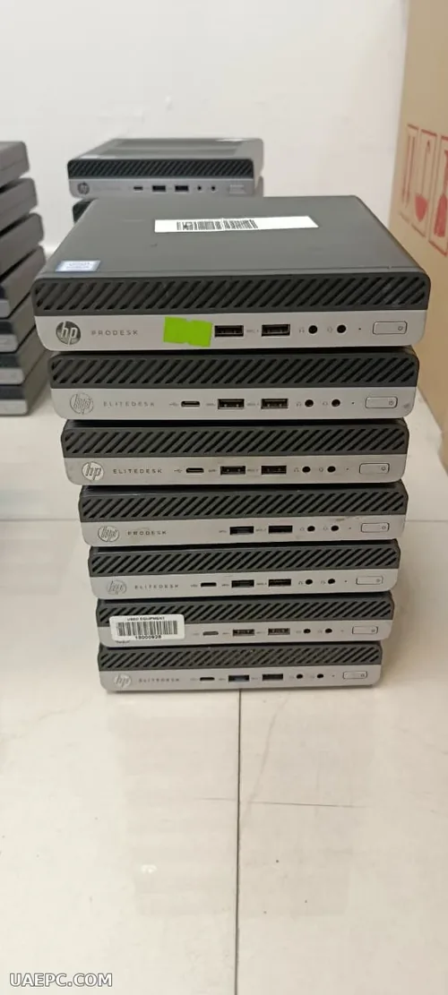 Second-hand business desktops stacked for a bulk order — B2B wholesale, Sharjah UAE