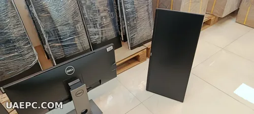 Second-hand business monitors on the warehouse shelf — B2B wholesale, Sharjah UAE