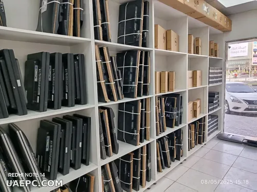 Second-hand business monitors on the warehouse shelf — B2B wholesale, Sharjah UAE
