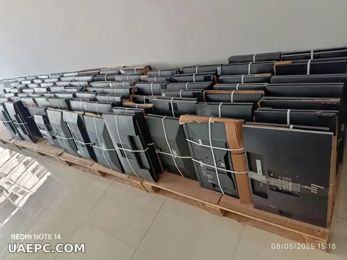 Second-hand business monitors on the warehouse shelf — B2B wholesale, Sharjah UAE