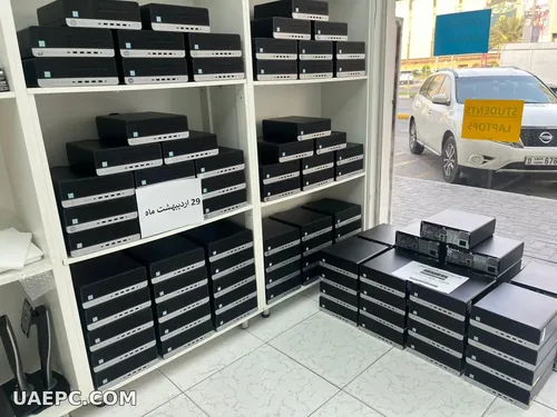 Second-hand business desktops stacked for a bulk order — B2B wholesale, Sharjah UAE