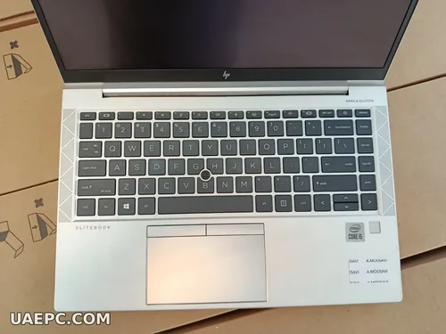 Second-hand business laptops stacked for a bulk order — B2B wholesale, Sharjah UAE